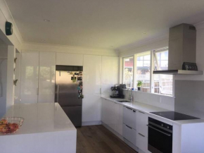 Modern, sunny, family home minutes from the city